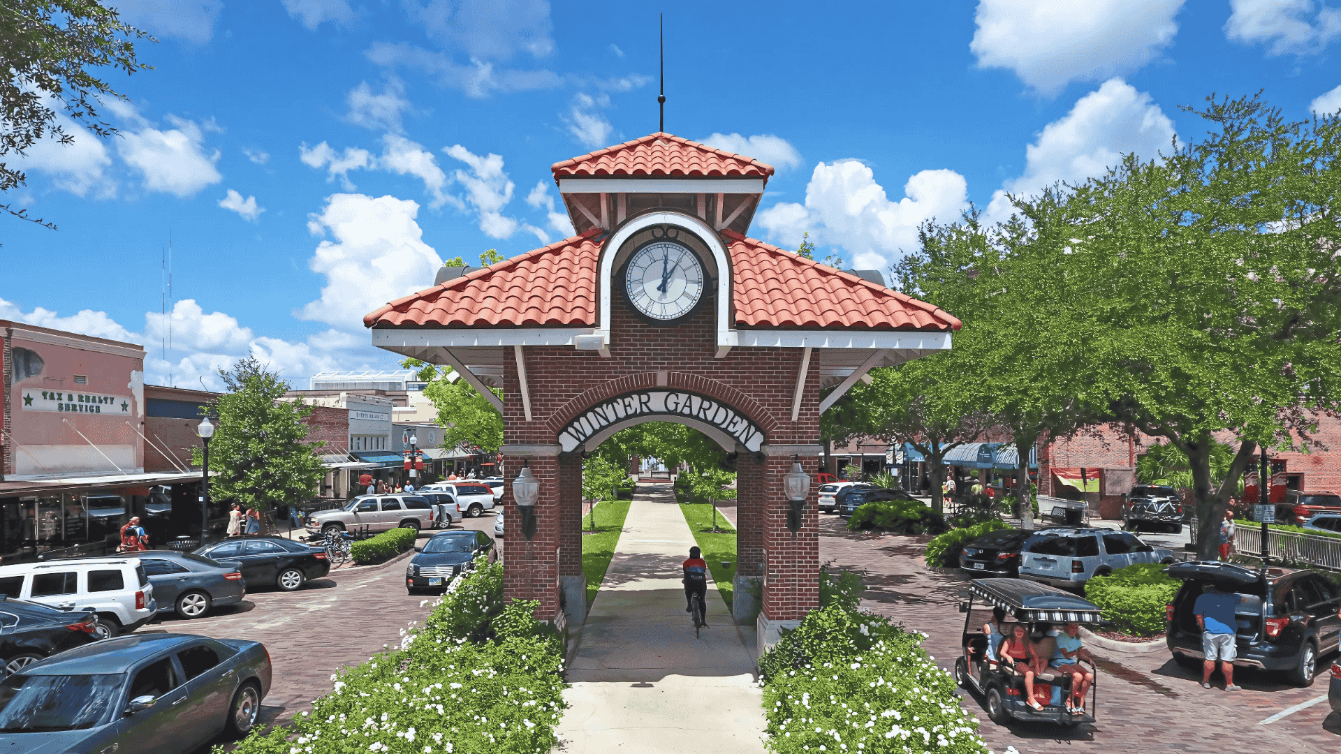 Brick clock-tower archway in downtown Winter Garden, part of Air Titans’s service area