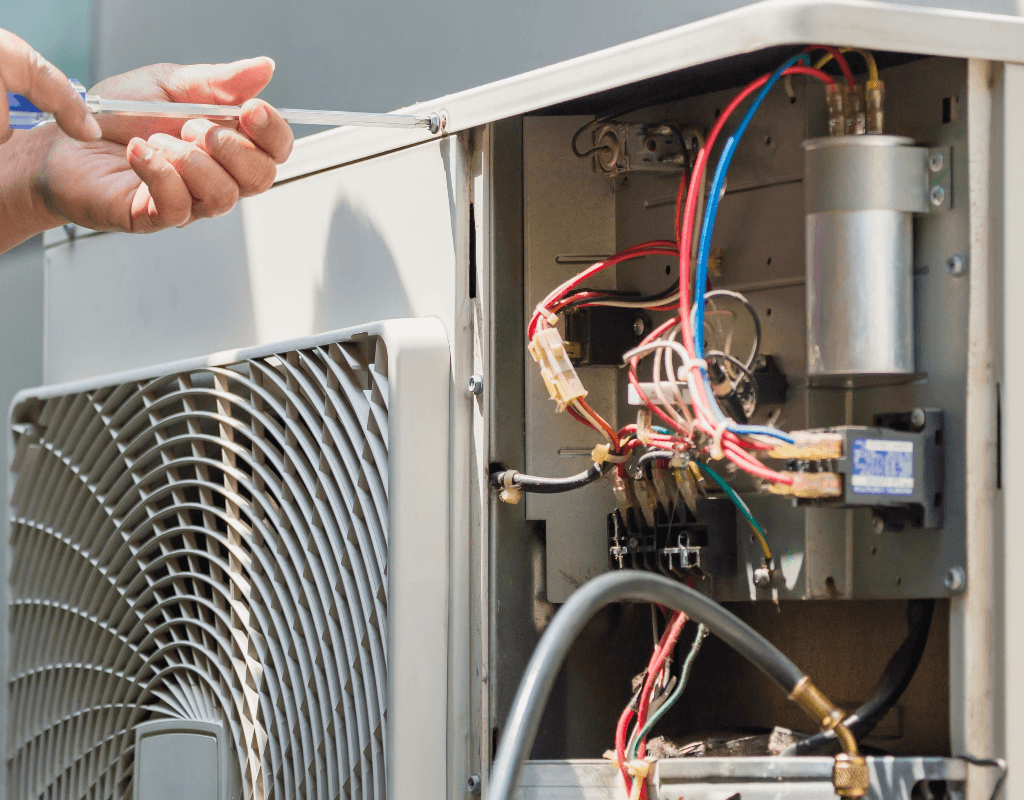 Air Titans HVAC technician repairing unit Osceola County FL