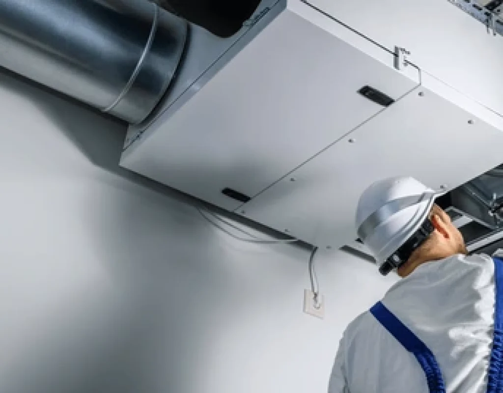 AC repair technician fixing unit in Winter Park FL