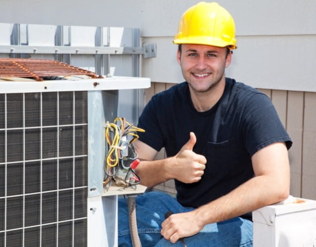 Air Titans technician performing AC repair St. Petersburg FL