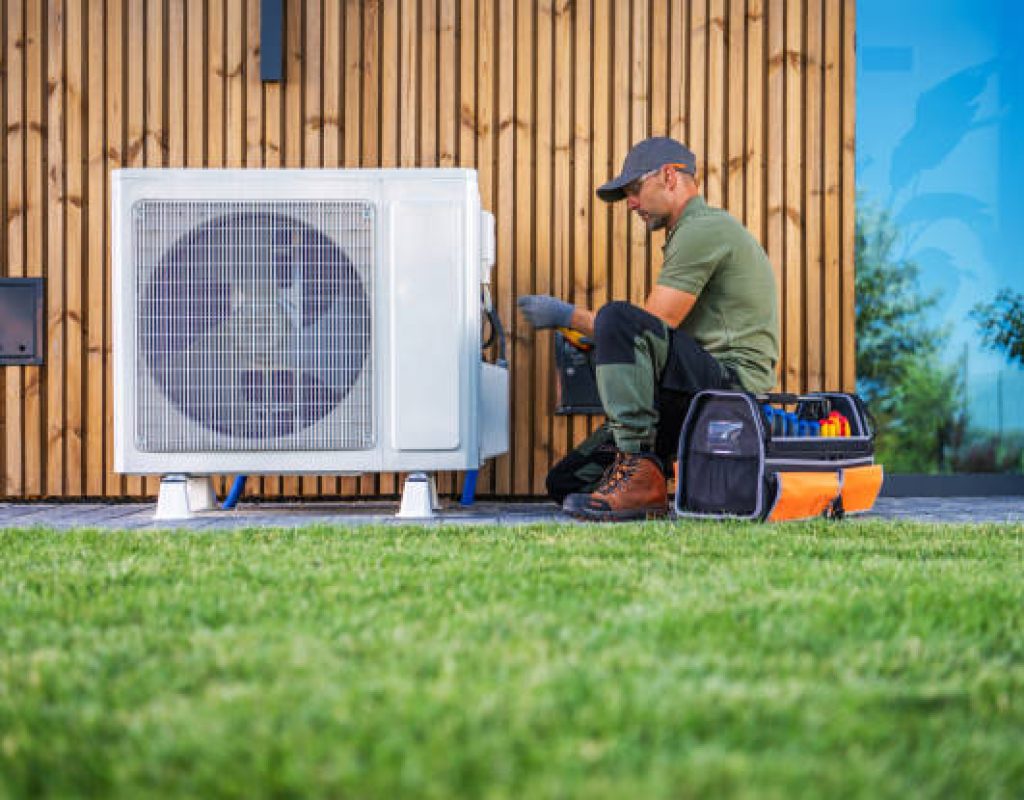 Air Titans technician performing AC repair in Tampa FL home